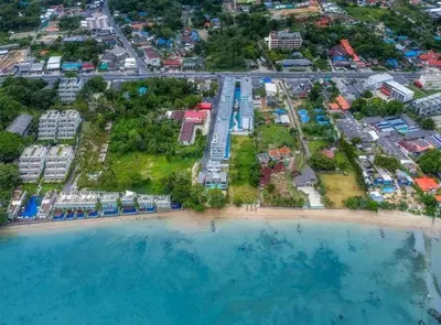 an aerial view of a resort on the beach at C244 Ocean Breeze 1BR Studio Steps from the Sea in Ban Saiyuan (1)