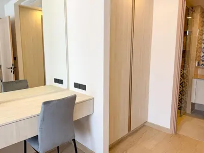a room with a desk with a chair and a mirror at C246 New 1BR Condo with Pool, Gym &Great Location in Thalang
