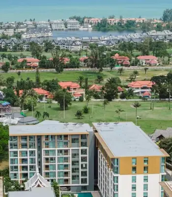 an aerial view of a building and a park at C246 New 1BR Condo with Pool, Gym &Great Location in Thalang