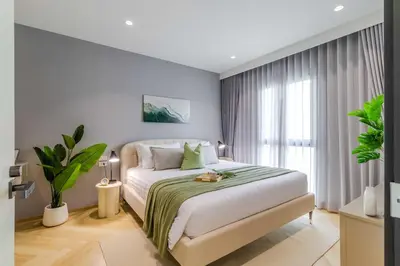a bedroom with a bed and a large window at C250 Brand new Stay near top beach & Boat Avenue in Thalang