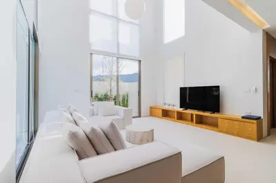 a living room with white furniture and a flat screen tv at V271 Smart Villa Full Amenities Best Stay Escape in Thalang