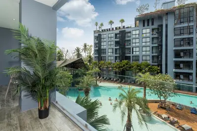 an aerial view of a hotel with a swimming pool at Deluxe 1BR Pool view 58SQM in Kamala Condo Citygate P302 in Kamala Beach