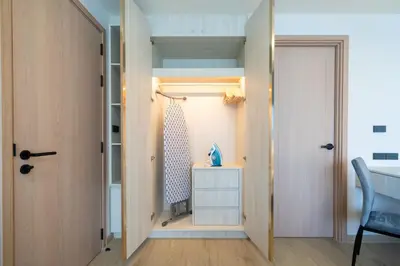 a small room with a closet and a door at Phuket Family apartment in Phuket Town