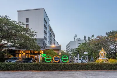 a sign that says olympics in front of a building at Recenta Phuket Suanluang by Deevana in Phuket Town