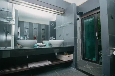 a bathroom with two sinks and a large mirror at Luxury Pool Villa a Short Walk from Bangtao Beach in Bang Tao Beach