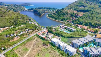 an aerial view of a river and a city at The Lago Nai Harn 2 Bedrooms by ALL HOMES in Rawai Beach