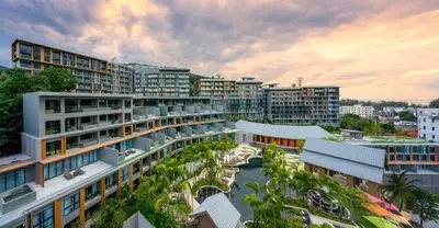 an aerial view of a building in a city at Private Villa at Mida Grande Resort in Surin Beach