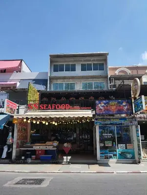 a store on the side of a street at SSS Room Patong in Patong Beach
