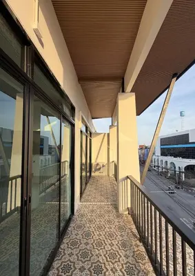 a balcony of a building with a view of the street at Laoteng Boutique Hotel in Phuket Town