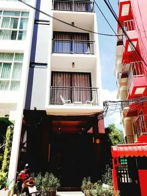 a motorcycle parked in front of a building at Arch Club in Patong Beach