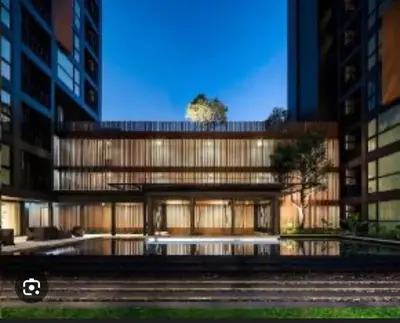 a rendering of a building with tall buildings at Elegant Stay with 360 degree Panoramic Rooftop Pool in Ban Sam Kong
