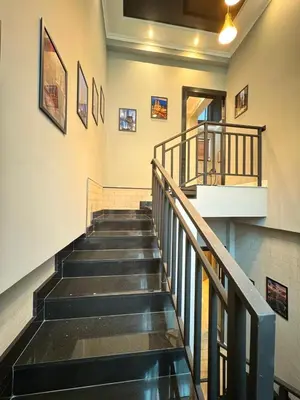 a stairway in a building with a stair case at Villa Maria Luxury in Kamala Beach