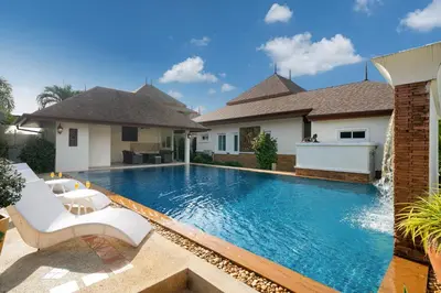 a swimming pool in the backyard of a house at Villa with Huge Private Pool and Tropical Garden Just 10 Minutes Walk to Kamala Beach in Kamala Beach