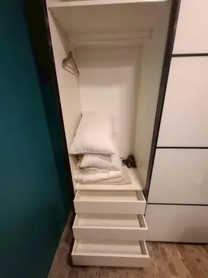 a small room with stairs leading to a bed at New Five Star Home- Patong Beach in Patong Beach