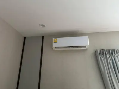 a air conditioner on the ceiling of a room at Апартаменты Пхукет in Phuket Town