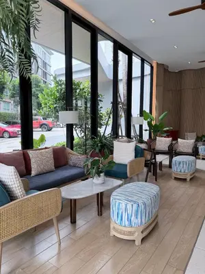 a lobby with couches and tables and windows at DCondo Kathu ใกล้หาดป่าตอง in Kathu