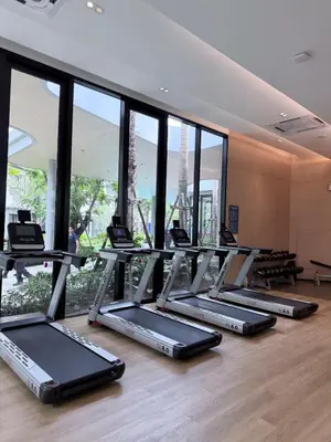 a gym with a row of treadmills at DCondo Kathu ใกล้หาดป่าตอง in Kathu