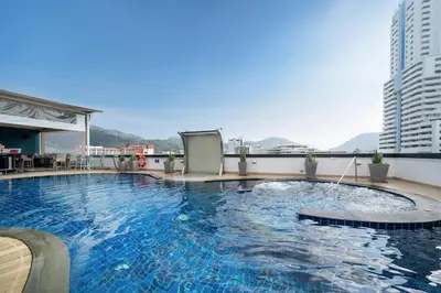 a large swimming pool on top of a building at Absolutely Amazing Bangla 1BR Suite in Patong Beach