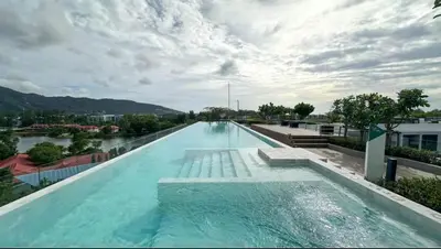 a large swimming pool on top of a building at Magnificent apartments in Laguna in Laguna Phuket