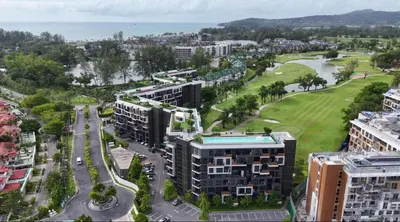 an aerial view of a city with buildings at Magnificent apartments in Laguna in Laguna Phuket
