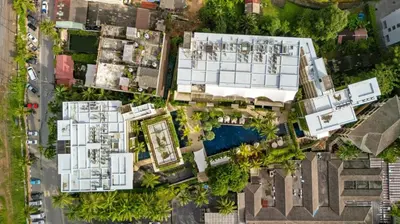 an overhead view of buildings in a city at Stylish 2BR Resort Condo with Seaview Surin in Phuket Town