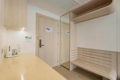 a dressing room with a mirror and a closet at Wyndham 2229 Naiton Beach Studio Forrest View in Phuket Town