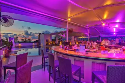 a bar on a rooftop with purple lighting at Bangla Jacuzzi Suite 212 in Patong Beach
