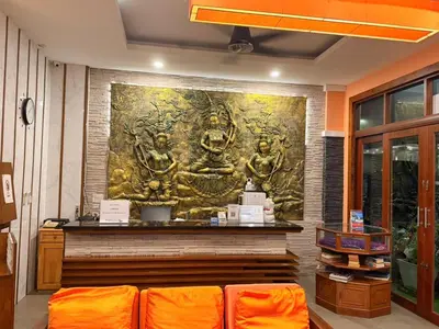 a large painting on the wall of a building at The Aura Patong in Patong Beach