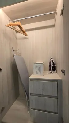 a room with a desk with a chair and a drawer at The Ozon Condotel by SP in Laguna Phuket