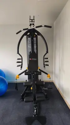 a black exercise bike in a room at The Ozon Condotel by SP in Laguna Phuket