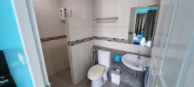 a small bathroom with a toilet and a sink at Bedroom201 Kata Beach Phuket in Kata Beach