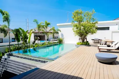 a swimming pool in the backyard of a house at Étoile Kata Luxury Pool Villas by Astra in Kata Beach