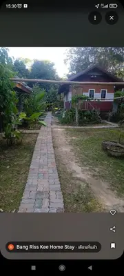 a picture of a brick road in front of a house at Bang Riss Kee Home Stay3 in Ko Yao Noi