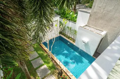 an overhead view of a swimming pool in a garden at Private villa at Oxygen Bangtao -pool garden BBQ in Ban Thalat Choeng Thale