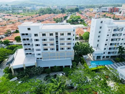 an aerial view of a building in a city at Recenta Suite Phuket Suanluang in Phuket Town