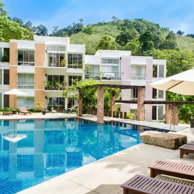 an image of a hotel with a swimming pool at Kamala Hills Ocean Breeze 3 Bedroom Loft with Access to 3 Pools in Kamala Beach