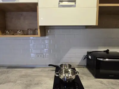 a kitchen stove with a pot on top of it at Urban Chill -1 Bedroom (T2-216) in Phuket Town