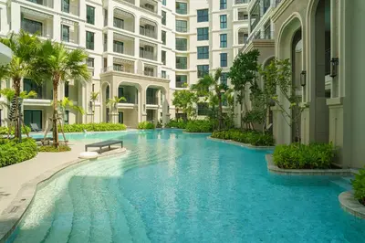 a swimming pool in the middle of a building at The Title Legendary Vintage Gloss in Bang Tao Beach