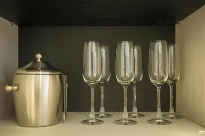 a row of wine glasses sitting on a counter at Bangtao The Title Legendary by Phuket Sabay Rent G201 in Bang Tao Beach