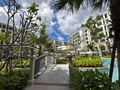 a walkway in front of a building at 1BR Apartment with Mountain View near Bang-Tao Beach CapitalPro in Bang Tao Beach