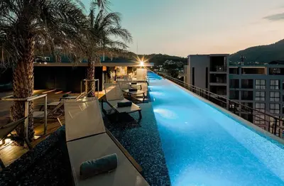 a large swimming pool on top of a building at C252 Great Facility Condo Near Beach & Rooftop Pool in Kamala Beach