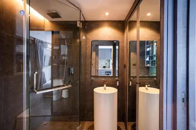 a bathroom with two sinks and a glass wall at C252 Great Facility Condo Near Beach & Rooftop Pool in Kamala Beach