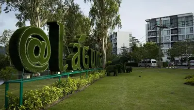 a sign for a zoo with elephants in a field at Skypark Laguna Apartment with Rooftop Pool at Bang Tao Phuket in Laguna Phuket