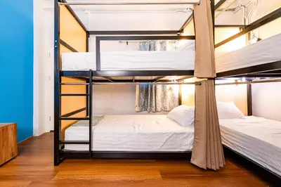 a couple of bunk beds in a room at Queen On Street 2009 in Ban Lo Long