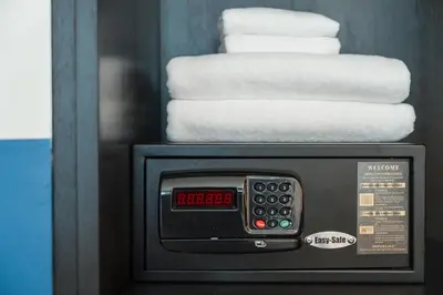 a close up of a bathroom machine with towels at Blu Monkey Boutique Naiharn - Serviced Apartments 2 Bedrooms in Rawai Beach