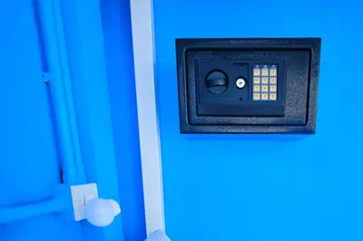 a blue door with an electrical box on it at Friendz Hostel in Phi Phi Don