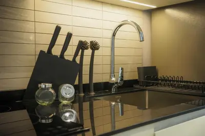 a kitchen counter with a sink and a sink at Bangtao The Title Legendary by Phuket Sabay Rent G402 in Bang Tao Beach