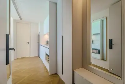 a room with a hallway with a window at Two Bedroom Sea View by Triple 8 Asia in Layan Beach