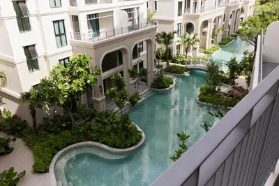 an aerial view of a building with a swimming pool at Новые апартаментыTitle Legendary in Bang Tao Beach