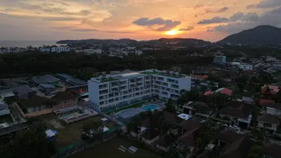 an aerial view of a city at sunset at Babylon Sky Garden 2 in Rawai Beach
